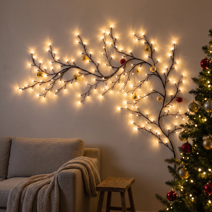 Lunora willow vine lights glowing warm white across a living room wall beside a Christmas tree
